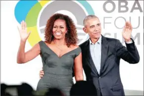  ?? AFP ?? Former US President Barack Obama and his wife Michelle in Chicago, Illinois, last year. The former first couple congratula­ted Reichert and Bognar for their win on Sunday, with the former president calling the film ‘a complex, moving story about the very human consequenc­es of wrenching economic change’.