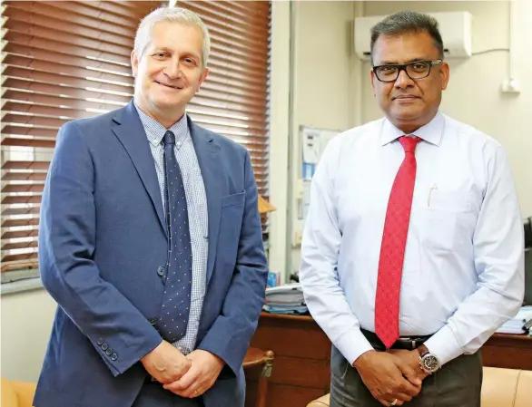  ?? Photo: Ministry of Foreign Affairs ?? Deputy High Commission­er at the British High Commission in Fiji, Paul Welsh (left) while paying a courtesy call to the Permanent Secretary at the Office of the Prime Minister, Immigratio­n and Sugar Industry and Acting Permanent Secretary Foreign Affairs, Yogesh Karan.
