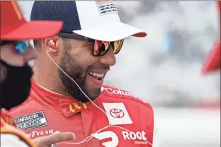  ?? AP - Brynn Anderson ?? While Bubba Wallace has spoken publicly about receiving his vaccinatio­n against COVID-19, other NASCAR drivers have not been as open.
