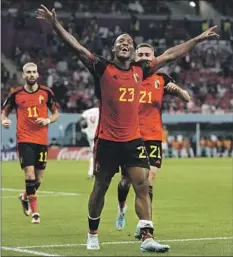  ?? Hassan Ammar Associated Press ?? MICHY BATSHUAYI celebrates his first-half goal for Belgium, which was all his team would need for a 1-0 victory over Canada in Group F.