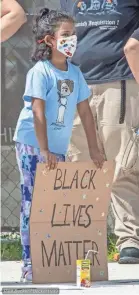  ?? PAUL BECKER ?? Sheza Hoque, 8, of Dublin, holds a Black Lives Matter sign at a Pint Size Protesters event at Bridge Park in Dublin in August.