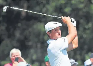  ??  ?? Bryson DeChambeau leads at the halfway stage in Hamburg.