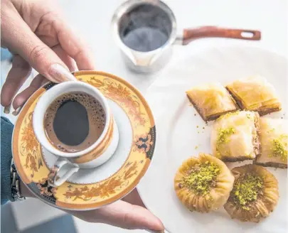  ?? Pictures / Greg Bowker, Doug Sherring ?? Clockwise from above: baqlawa with Arabic coffee at Shefco; shawarma from Petra Shawarma; kibbeh from Ima; knefeh from Gemmayze Street.