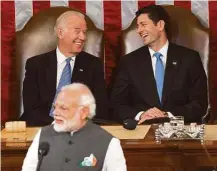  ?? Evan Vucci / Associated Press ?? Vice President Joe Biden, top left, and House Speaker Paul Ryan share a laugh as Indian Prime Minister Narendra Modi addresses a joint meeting of Congress on Wednesday.