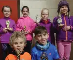  ??  ?? U8 winners back row: Emily Kelly 1st, Hope O’Brien 2nd, Chloe McDonagh 3rd. Front row: Eoin Lawley 2nd and Pol Arnold 1st.