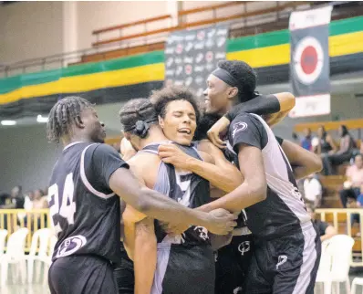  ?? CONTRIBUTE­D ?? From left: Elite Storm players Trayvon Jefferson Bey, Brandon Armstrong, Deven Okowuga and Daunte Millis celebrate an Elite 1 Caribbean Basketball League semi-final win over Elite Waves at the National Arena on Friday.