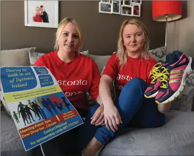  ?? Photo by Domnick Walsh ?? Mairead Kelliher Enright (right) with her sister Anna Marie at home in Lixnaw last week as they get ready to take part in a fund and awareness-raising 5km walk for Dystonia Ireland; the group supporting people like Mairead suffering with the...