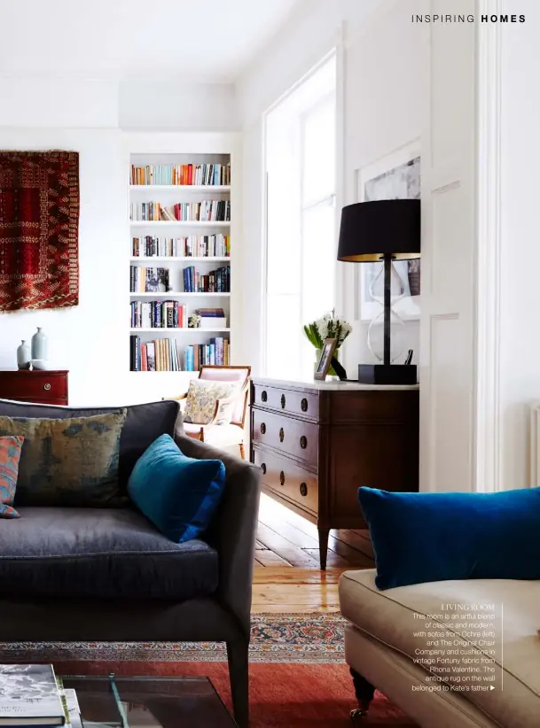  ??  ?? LIVING ROOM
This room is an artful blend of classic and modern, with sofas from Ochre (left) and The Original Chair Company and cushions in vintage Fortuny fabric from Rhona Valentine. The antique rug on the wall belonged to Kate’s father