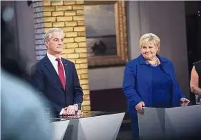  ??  ?? Meeting of minds: Solberg (right) and Store attending a televised debate following a parliament­ary election in Oslo. — Bloomberg