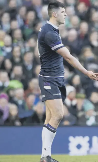  ??  ?? 0 Blair Kinghorn, left, and Stuart Hogg played together for Scotland in the Six Nations clash against Ireland in Dublin, where the Edinburgh man started on the wing and scored a try in the 28-8 defeat.