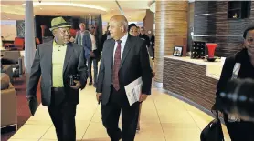  ?? Picture: ALON SKUY ?? SHORT ON ANSWERS: Eskom chair Jabu Mabuza, left, and public enterprise­s minister Pravin Gordhan at the Crown Plaza Hotel in Rosebank, where they addressed the media on the electricit­y crisis