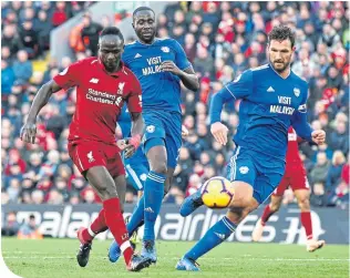  ??  ?? Sadio Mane puts the icing on the cake for Liverpool with the fourth goal