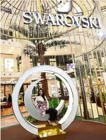  ??  ?? Shoppers can redeem a RM50 voucher at Swarovski by posting a picture of themselves with the Swarovski Swing on Instagram or Facebook under the #Brilliance­ForAll hashtag.