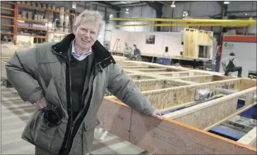  ?? Dean Bicknell, Calgary Herald ?? Tim Vermaat stands in the Calgary plant where C&V Portable Accommodat­ions manufactur­es its products.