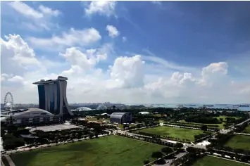  ?? ?? The penthouse up for auction has an unblocked view of the sea. Pictured is a view of the Singapore Strait from the Marina Bay area