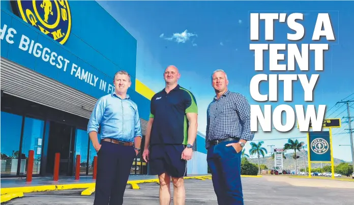  ??  ?? NEW TENANT: Tentworld will soon occupy the former Gold’s Gym, a deal celebrated by store manager Nick Weatherall ( centre) and Knight Frank’s Mark Fitzgerald ( left) and Paul Dury.