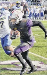  ?? John Carl D’annibale / Times Union ?? Ualbany’s Dev Holmes gains ground on one of his four catches Saturday. Holmes’ coach thought his receiver was repeatedly held.