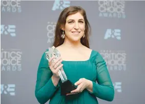  ?? (Danny Moloshok/Reuters) ?? MAYIM BIALIK displays her best supporting actress award for ‘The Big Bang Theory,’ at the 21st Annual Critics’ Choice Awards in Santa Monica, California, in January 2016.