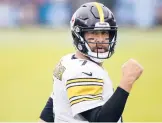  ?? BRETT CARLSEN/AP ?? Two-time Super Bowl champ Ben Roethlisbe­rger will take a pay cut to re-sign with the Steelers on a one-year deal. Roethlisbe­rger, 39, will earn $14 million.