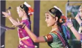 ?? LI XIN / XINHUA ?? Chinese children perform Indian classical dance at an Indian tourism roadshow in Beijing on Tuesday.