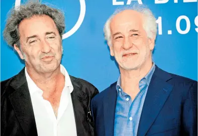  ?? CLAUDIO ONORATI/EFE ?? El realizador acudió acompañado de su actor fetiche, quien encarna a su padre