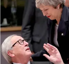  ??  ?? File photo shows Theresa May and Juncker take part in a European Union leaders summit in Brussels, Belgium. — Reuters photo