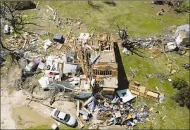  ?? Jaime Green Wichita Eagle ?? A HOUSE destroyed by Friday’s tornado in south-central Kansas. The local fire chief said residents “still have scars” from an even worse tornado that hit in 1991.