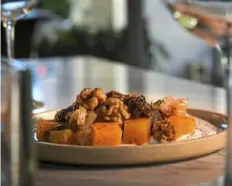  ?? Steve Mellon/Post-Gazette ?? Glazed beets with fig mostarda, candied walnuts and yogurt at Talia.