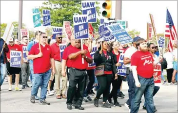  ?? BILL PUGLIANO/GETTY IMAGES/AFP ?? General Motors (GM) workers went out on strike on September 16. Union negotiator­s say talks have taken ‘a turn for the worse’.
