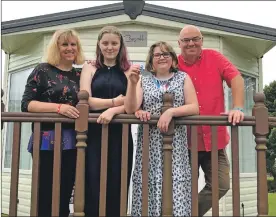  ??  ?? Susan and Andrew Simpson with daughters Charis and Niamh at the Tralee Bay caravan.