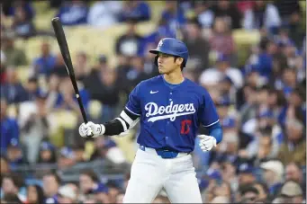  ?? JAE C. HONG — THE ASSOCIATED PRESS ?? Los Angeles Dodgers star Shohei Ohtani prepares to bat during the second inning of a spring training game against the Los Angeles Angels on Monday, March 25, 2024, in Los Angeles.