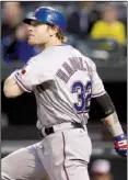  ?? AP/PATRICK SEMANSKY ?? Texas outfielder Josh Hamilton hit tworun home runs in the first, third, seventh and eighth innings Tuesday night. He also had a fifth-inning double.