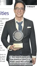  ??  ?? Michael V
Ryan Agoncillo beams with pride holding his trophy as 2017 Reader’s Digest Most Trusted Entertainm­ent/Variety Presenter