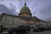  ?? JACQUELYN MARTIN — THE ASSOCIATED PRESS ?? Dusk falls over the Capitol in Washington on Monday.