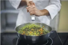  ?? ?? One of Charles Guilloy’s signature dishes, a dal made with locally grown lentils. Below, the world’s biggest salad bar will be provided.