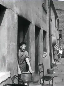  ??  ?? Abject poverty
Families in 1930s Barnsley. In 1936, Orwell witnessed the slums and misery of the Yorkshire town, an experience that reinforced his belief that capitalism was the enemy of the poor