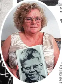  ?? ?? Haunting image: Keith’s mum Winnie with the famous ‘missing’ poster of her son