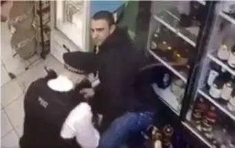  ??  ?? CCTV footage of the arrest