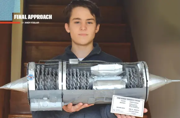  ??  ?? Tim Rinaldi, age 16, with his homemade model of the Pratt &amp; Whitney JT8D Turbofan engine.