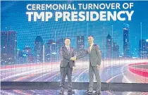  ?? PHOTO BY ANJO PEREZ ?? PASSING THE BATON
Outgoing Toyota Motor Philippine­s President Atsuhiro Okamato (left) shakes hands with incoming TMP President Masando Hashimoto during the turnover of leadership ceremony on Tuesday, Feb. 20, 2024, at the Grand Hyatt Hotel in Taguig City.