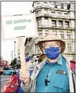  ??  ?? An anti-Brexit demonstrat­or holds a placard outside the Houses of Parliament, in London, Wednesday, Sept. 23, 2020. Michel Barnier is due to hold talks with his British counterpar­t David Frost in London Wednesday ahead of a ninth formal round of negotiatio­ns
next week. (AP)