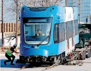  ?? [PHOTO BY STEVE SISNEY, THE OKLAHOMAN] ?? The streetcar “Clear Sky Blue,” is the third to be delivered by the manufactur­er, Brookville Equipment Corp. It arrived March 12 at the streetcar maintenanc­e facility in Oklahoma City.