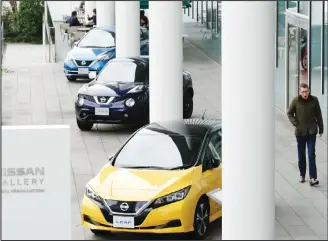  ??  ?? New cars are displayed at a showroom at the Nissan headquarte­rs in Yokohama on Dec 10. (AFP)