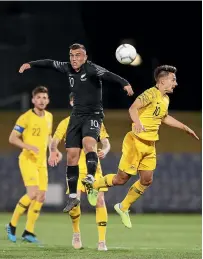  ?? GETTY IMAGES ?? Clayton Lewis, centre, leapt at the chance to join the Olywhites for their Olympic qualifying campaign.