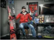  ?? THE ASSOCIATED PRESS ?? In this file photo, Mike Schultz, who is preparing to compete in the 2018Winter Paralympic­s in South Korea, poses for a photo in his shop in St. Cloud, Minn.