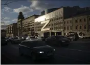  ?? THE ASSOCIATED PRESS ?? Cars in Moscow, Russia, drive past a building decorated with a huge letter “Z,” which has become a symbol of the Russian military operation in Ukraine, along with a hashtag reading, “We don't abandon our own.”