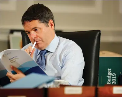  ?? Photo: Gerry Mooney ?? Last-minute adjustment­s: Finance Minister Paschal Donohoe reviews Budget 2019 in his office in the Department of Finance ahead of today’s presentati­on to the Dáil.