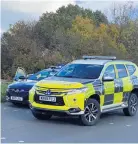  ?? LEICESTER MEDIA ?? 999 RESPONSE: Police cars at the scene of the collision in Wanlip