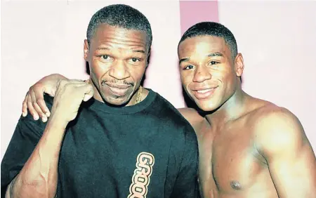  ?? Picture: GETTY IMAGES ?? CHIP OFF THE OLD BLOCK: Floyd Mayweather Jr poses with his father Floyd Mayweather, after he winning the fight against Sam Girard on February 28 1998 in Atlantic City, New Jersey. Floyd Mayweather Jr explains how his father nurtured him to become one...