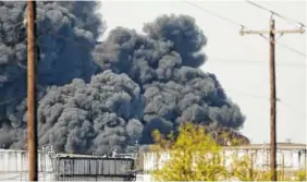  ?? AP PHOTO/GODOFREDO A. VASQUEZ ?? The petrochemi­cal fire at Interconti­nental Terminals Company reignited as crews tried to clean out the chemicals that remained in the tanks Friday in Deer Park, Texas.